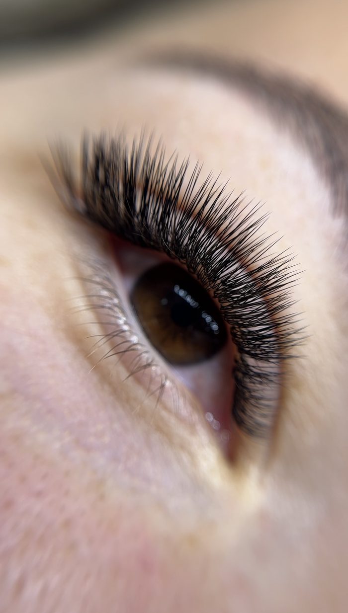 Close-up of finished eyelash extensions